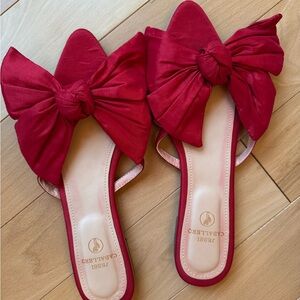 Jessi Caballero red flats with oversized bow design